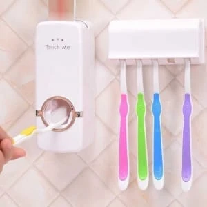 AUTOMATIC TOOTHPASTE DISPENSER WITH TOOTHBRUSH HOLDER