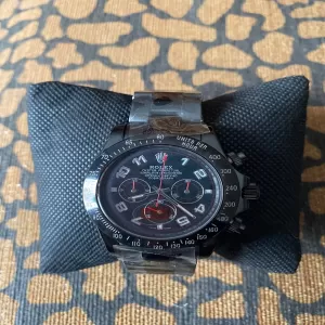 Black Rolex watch