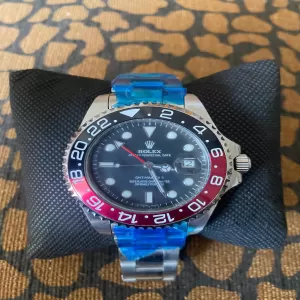 Silver Rolex watch