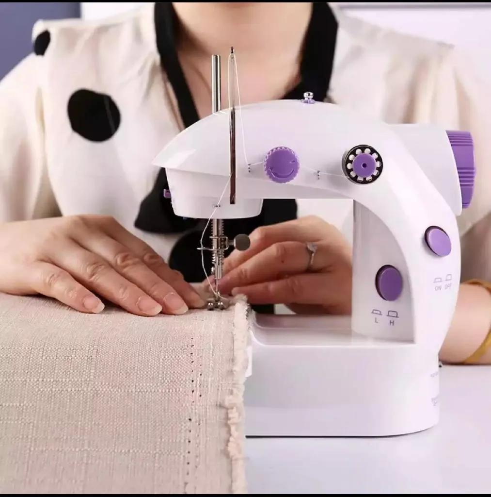 Generic 4-in-1 Portable Sewing Machine with Adapter & Pedal - image 1