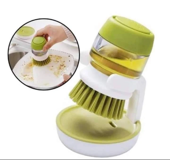 Soap dispensing palm brush with storage stand