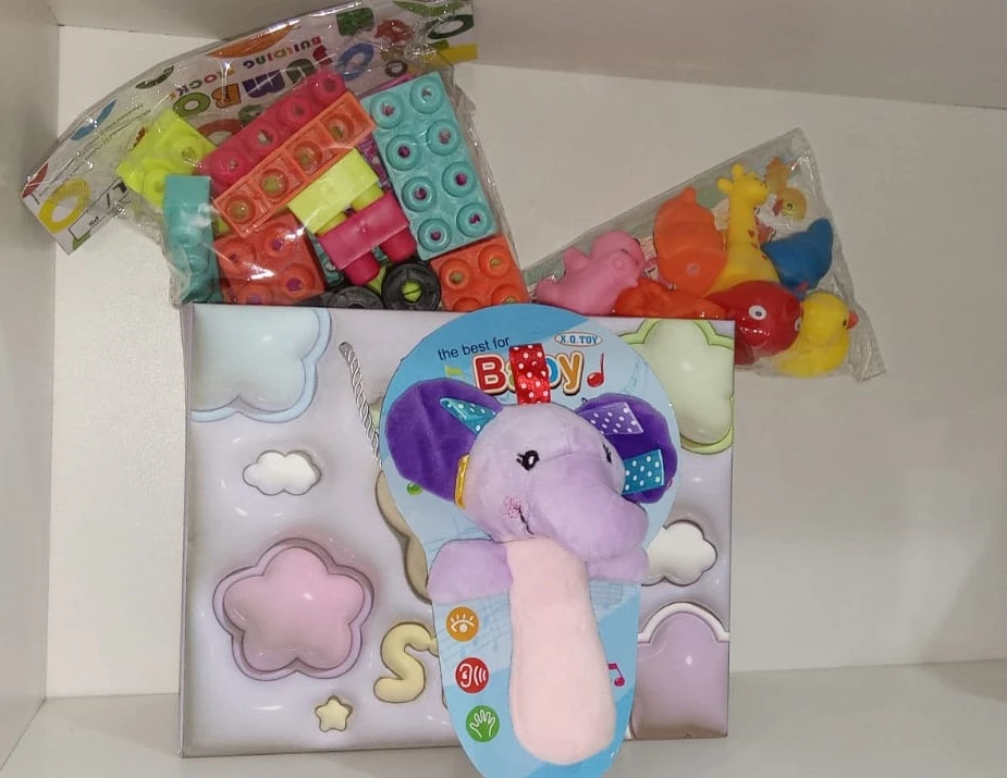 Gift set for children with Soft toy, bricks, bath toys