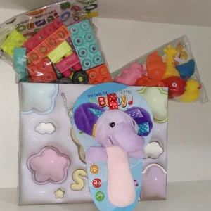 Gift set for children with Soft toy, bricks, bath toys